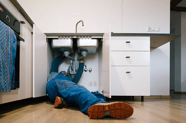 Professional Emergency Plumber technician working in Wellsville, NY